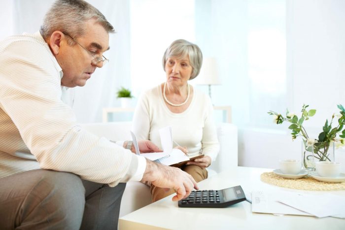 22247351_l- mature man and his wife making financial revision at home